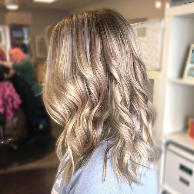 Converted this beauty from full-head foiled weave to a natural icy balayage. This is ideal for easy grow out and to give blondes a break from lightner. We always recommend adding a gloss to your color service for added shine and silkiness. Icy blonde highlights by stylist Jessica Gossard of My Hair Therapy Sandy Luxury Hair Salon